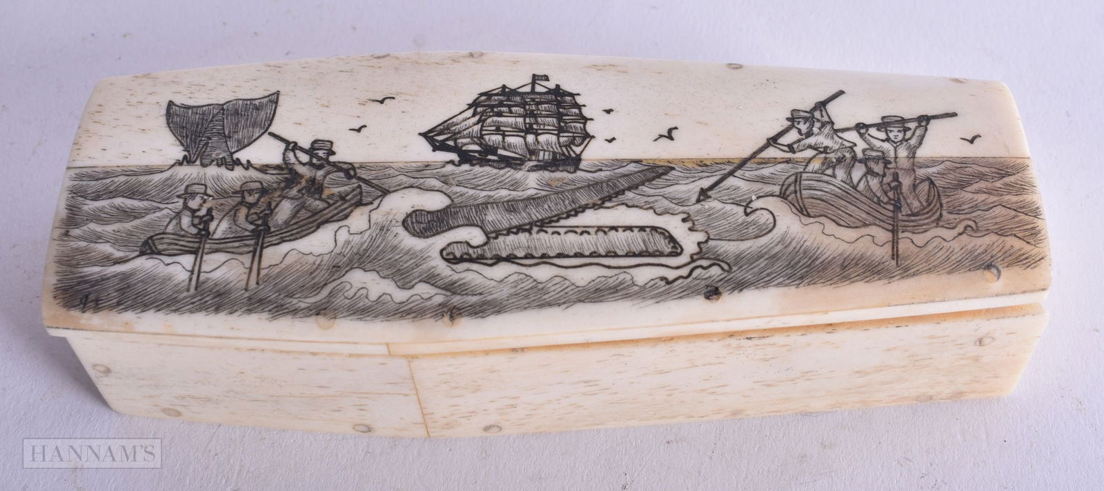 A Bone Coffin with Skeleton. 2.8cm x 11.5 cm x 4.3cm, weight 133g: A Bone Coffin with Skeleton. 2.8cm x 11.5 cm x 4.3cm, weight 133g