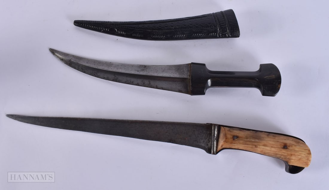 TWO LARGE ANTIQUE EASTERN HORN HANDLED DAGGERS. Largest 41 cm long. (2) WE ARE UNABLE TO OFFER IN H (1 of 6)