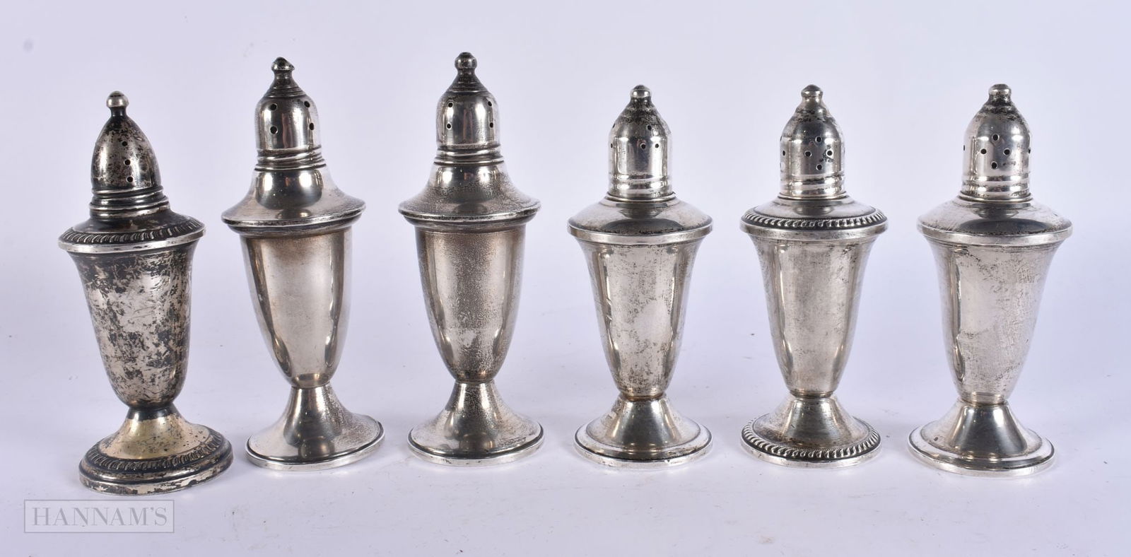THREE PAIRS OF SILVER CONDIMENTS. 690 grams overall. 13 cm high. (6): THREE PAIRS OF SILVER CONDIMENTS. 690 grams overall. 13 cm high. (6)