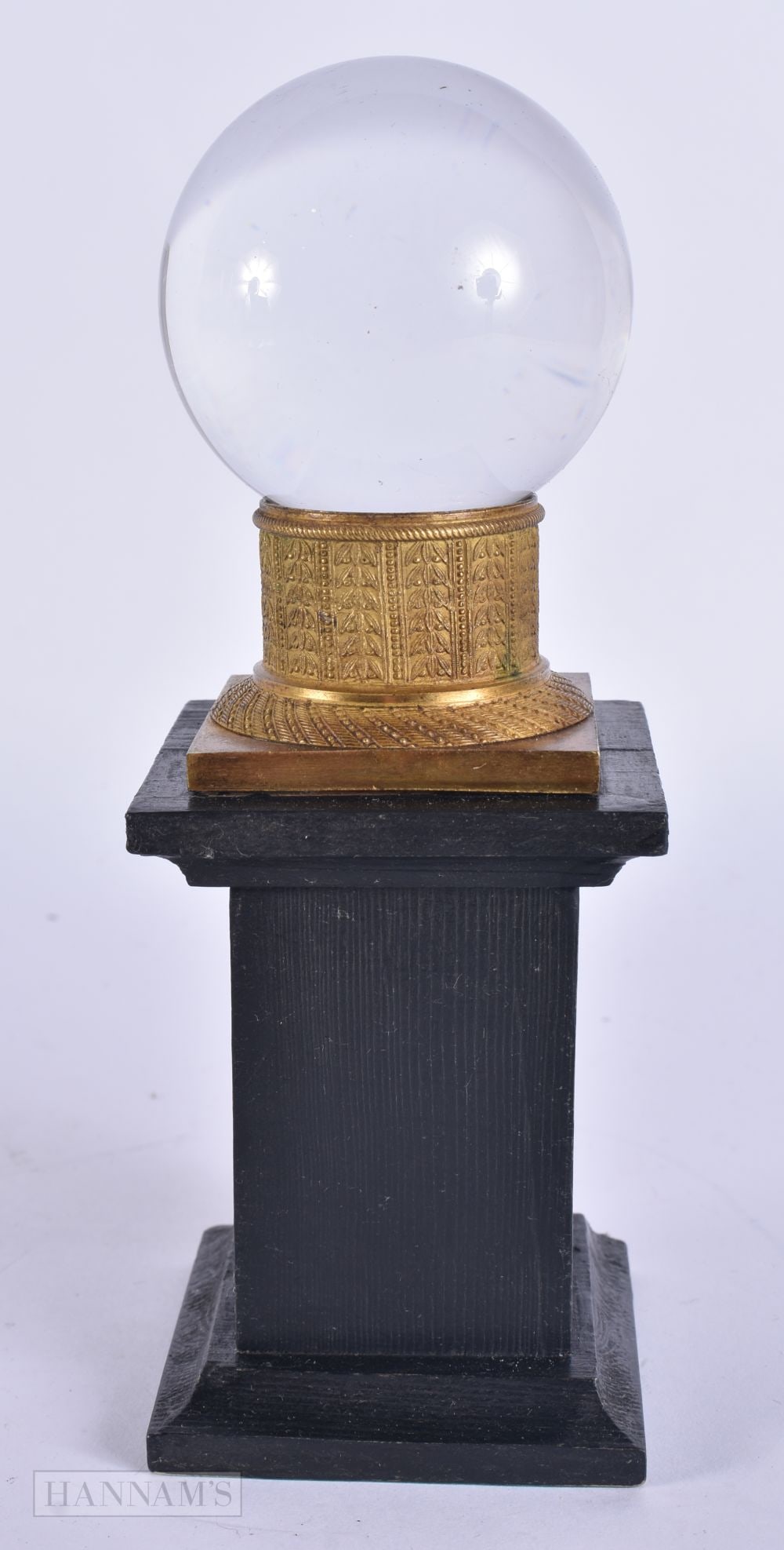 AN ANTIQUE CRYSTAL BALL ON STAND. 19 cm high. (1 of 5)