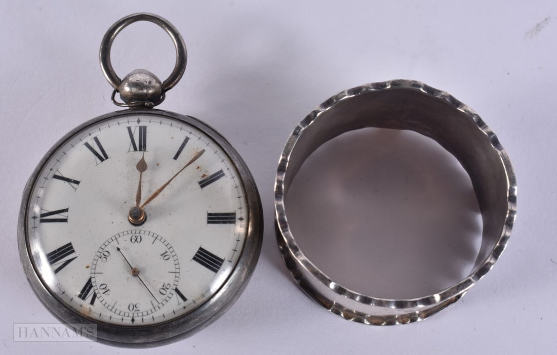 AN ANTIQUE SILVER POCKET and a silver napkin ring. Ring 27 grams, watch 130 grams (untested). (2) (1 of 6)
