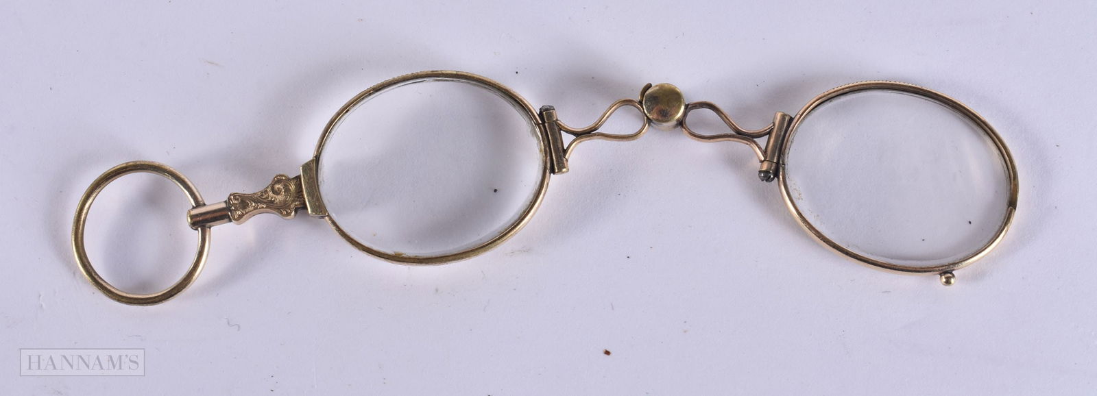 A PAIR OF YELLOW METAL LORGNETTES. 10 cm x 8 cm.: A PAIR OF YELLOW METAL LORGNETTES. 10 cm x 8 cm.