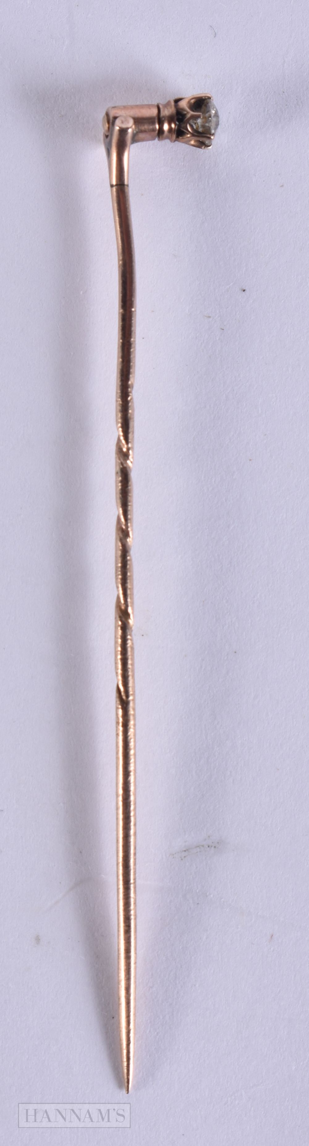 A 9CT GOLD AND DIAMOND STICK PIN. 1 grams. 7 cm long.: A 9CT GOLD AND DIAMOND STICK PIN. 1 grams. 7 cm long.