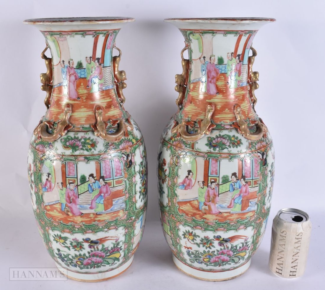 A LARGE PAIR OF 19TH CENTURY CHINESE CANTON FAMILLE ROSE VASES Qing. 43.5 cm high.: A LARGE PAIR OF 19TH CENTURY CHINESE CANTON FAMILLE ROSE VASES Qing. 43.5 cm high.