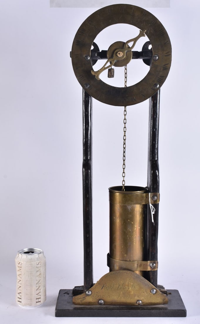 AN UNUSUAL ANTIQUE ENGLISH CLOCK with engraved dial and wooden frame. 63 cm x 24 cm. (1 of 8)