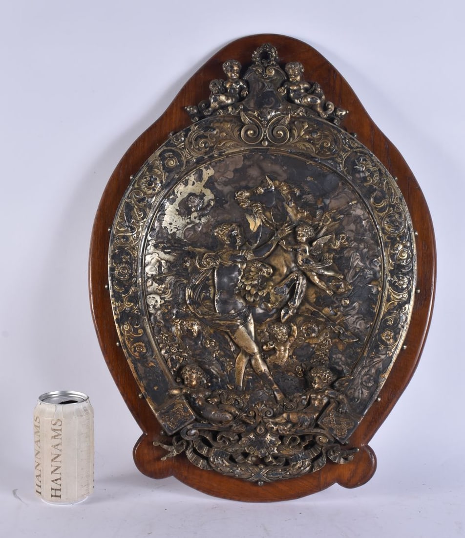 A LARGE 18TH/19TH CENTURY GRAND TOUR PARTIAL GILDED REPOUSSE PLAQUE upon a later oak shield. 54 cm x (1 of 12)