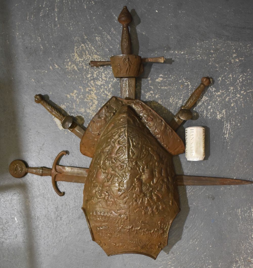 AN UNUSUAL VICTORIAN MILITARY INTEREST COAT OF ARMS WEAPONS DISPLAY upon a large oak shield. 82 cm x: AN UNUSUAL VICTORIAN MILITARY INTEREST COAT OF ARMS WEAPONS DISPLAY upon a large oak shield. 82 cm x 72 cm.
