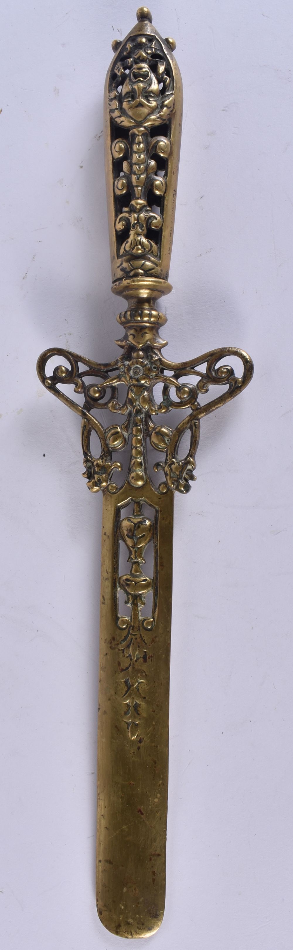 A 19TH CENTURY TOWNSEND & CO BRONZE LETTER OPENER with reticulated mask head handle. 34.5 cm long. (1 of 5)