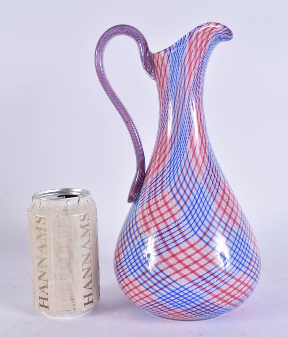 A 1950S ITALIAN MURANO LATTICINIO PINK AND BLUE TWIST GLASS JUG. 28 cm high. (1 of 5)