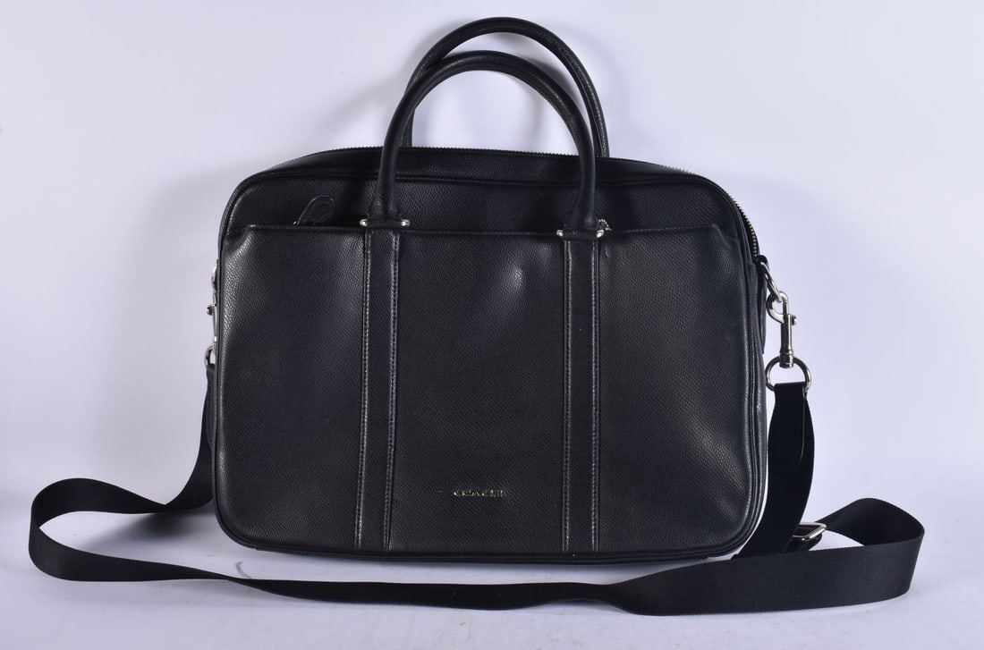 A COACH LEATHER HANDBAG. 44 cm wide. (1 of 3)