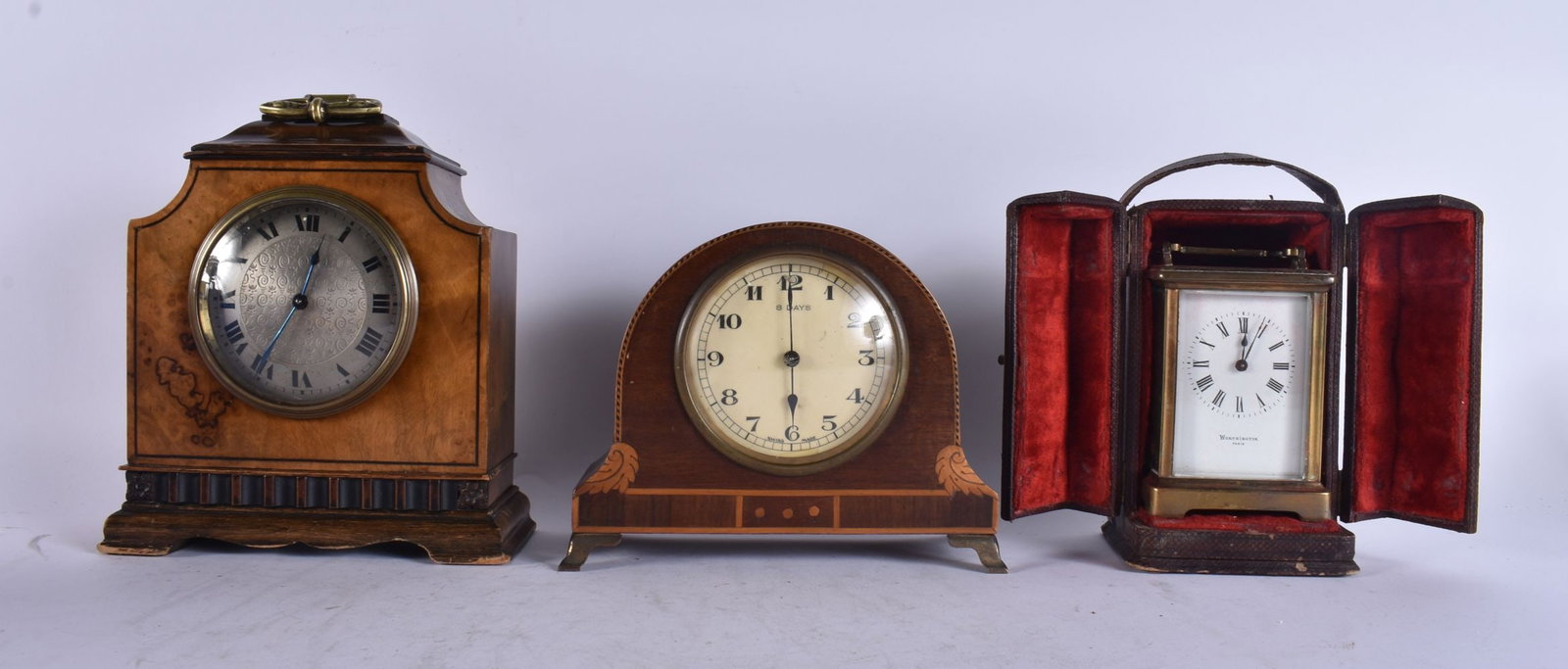TWO MANTEL CLOCKS together with a leather cased carriage clock. 1 running. (3) (1 of 5)