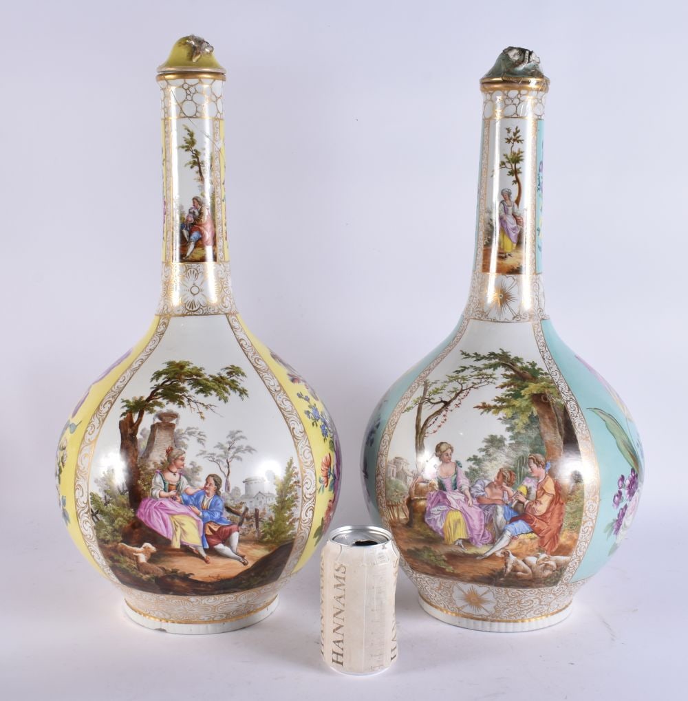 A VERY LARGE PAIR OF 19TH CENTURY GERMAN PORCELAIN BOTTLE VASES AND COVERS painted with lovers in la (1 of 9)