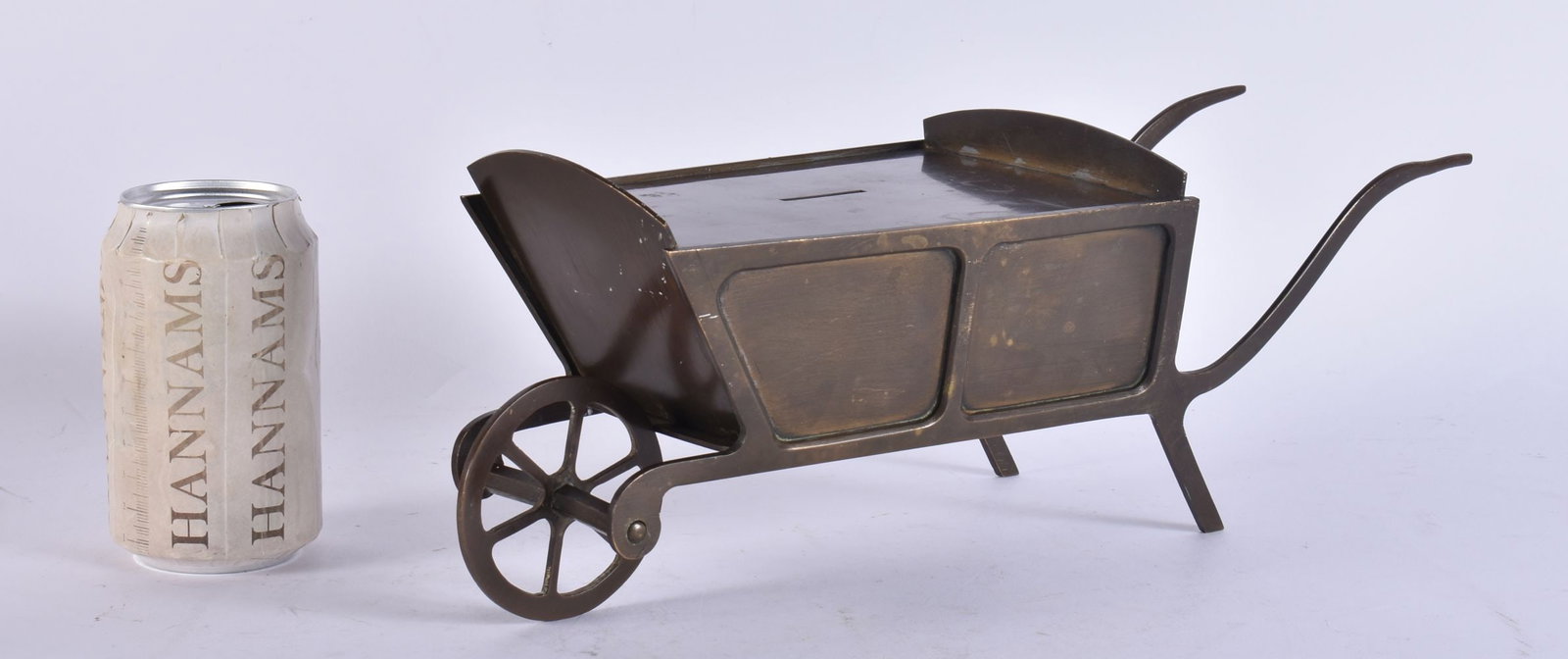 AN ANTIQUE AMERICAN FOLK ART BRONZE WHEELBARROW MONEY BOX. 32 cm x 12 cm. (1 of 5)