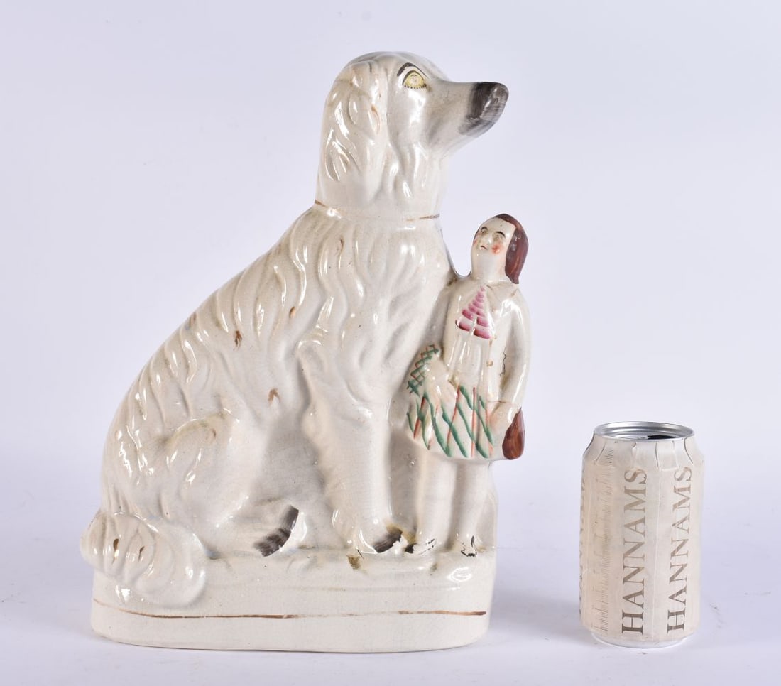 AN UNUSUAL LARGE 19TH CENTURY STAFFORDSHIRE FIGURE OF A DOG modelled beside a Scottish male. 32 cm x (1 of 4)