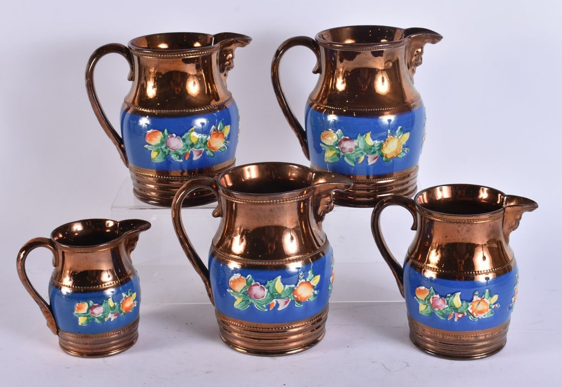 A SET OF FIVE VICTORIAN LUSTRE JUGS. Largest 16 cm x 13 cm. (5) (1 of 5)
