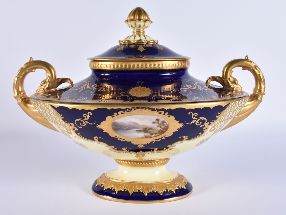 A COALPORT PORCELAIN TWIN HANDLED VASE AND COVER painted with landscapes. 25 cm x 20 cm. (1 of 7)