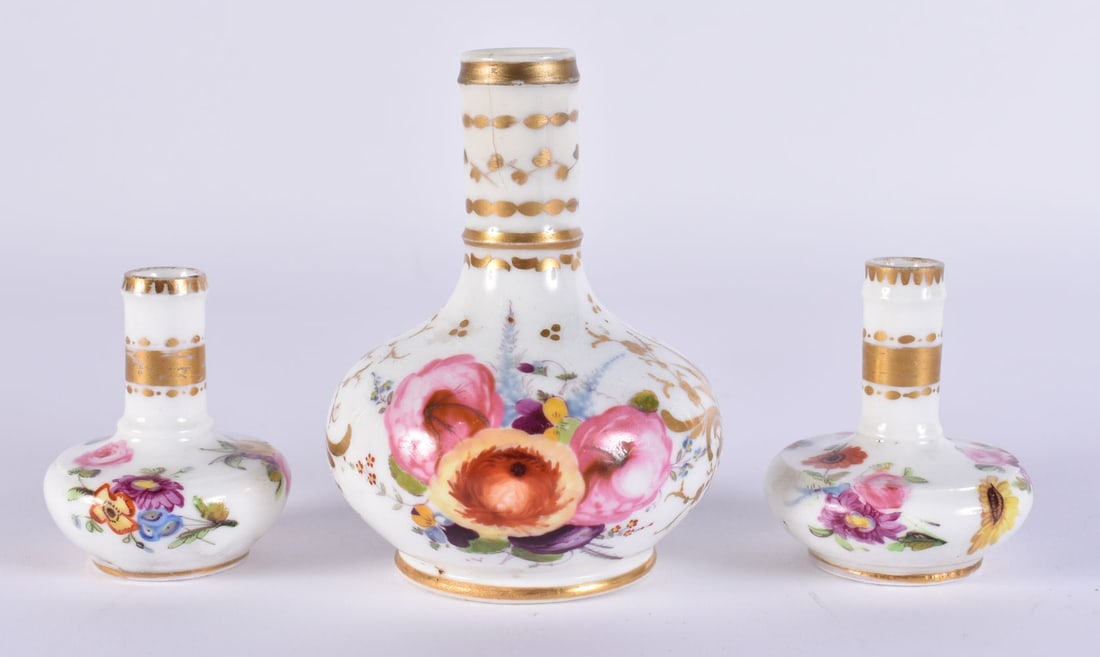 A SET OF THREE MID 19TH CENTURY ENGLISH PORCELAIN VASES. Largest 8.75 cm high. (3) (1 of 4)