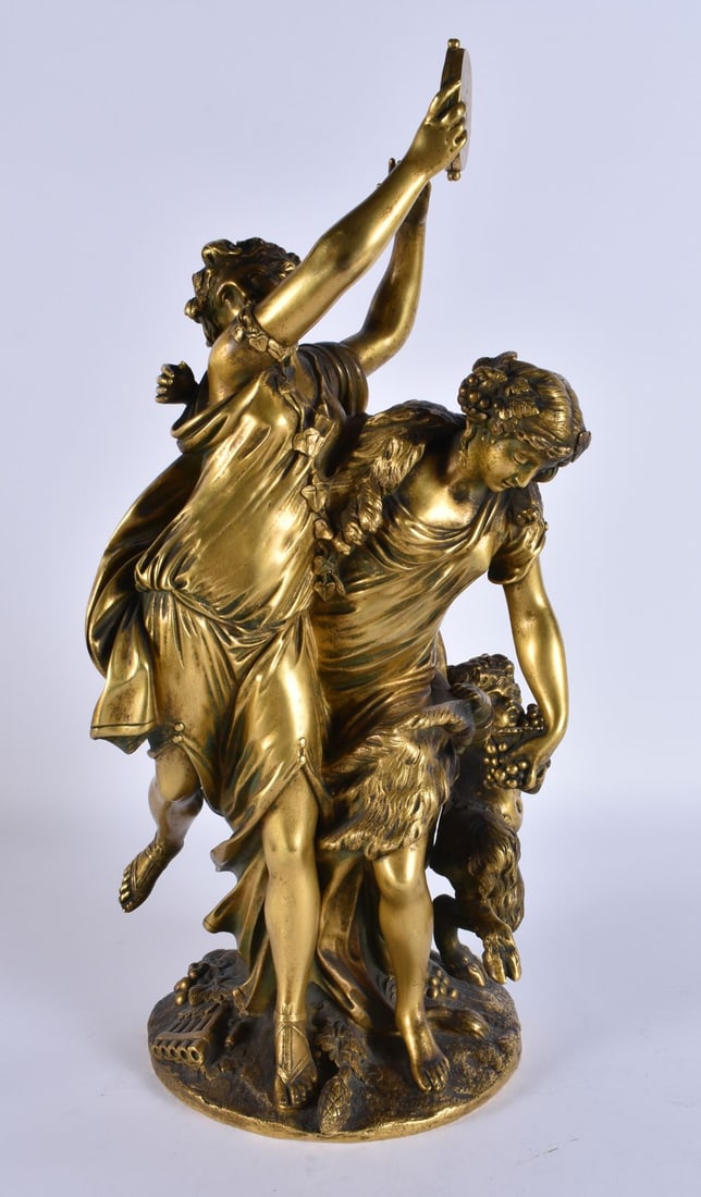 A LARGE 19TH CENTURY FRENCH GILT BRONZE FIGURE OF FEMALES modelled holding a tambourine beside a rep (1 of 7)