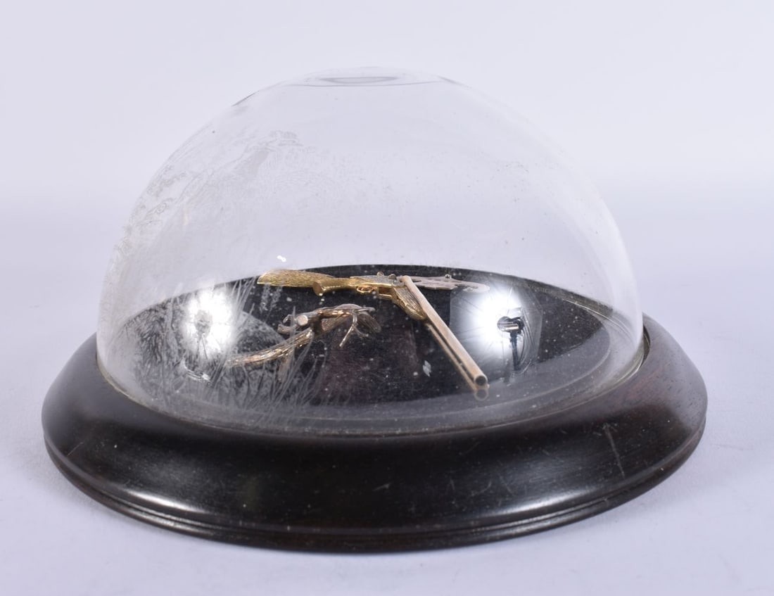 AN ARTHUR PRICE OF LONDON SILVER SHOTGUN contained within an unusual engraved glass dome. 18 cm wide (1 of 6)