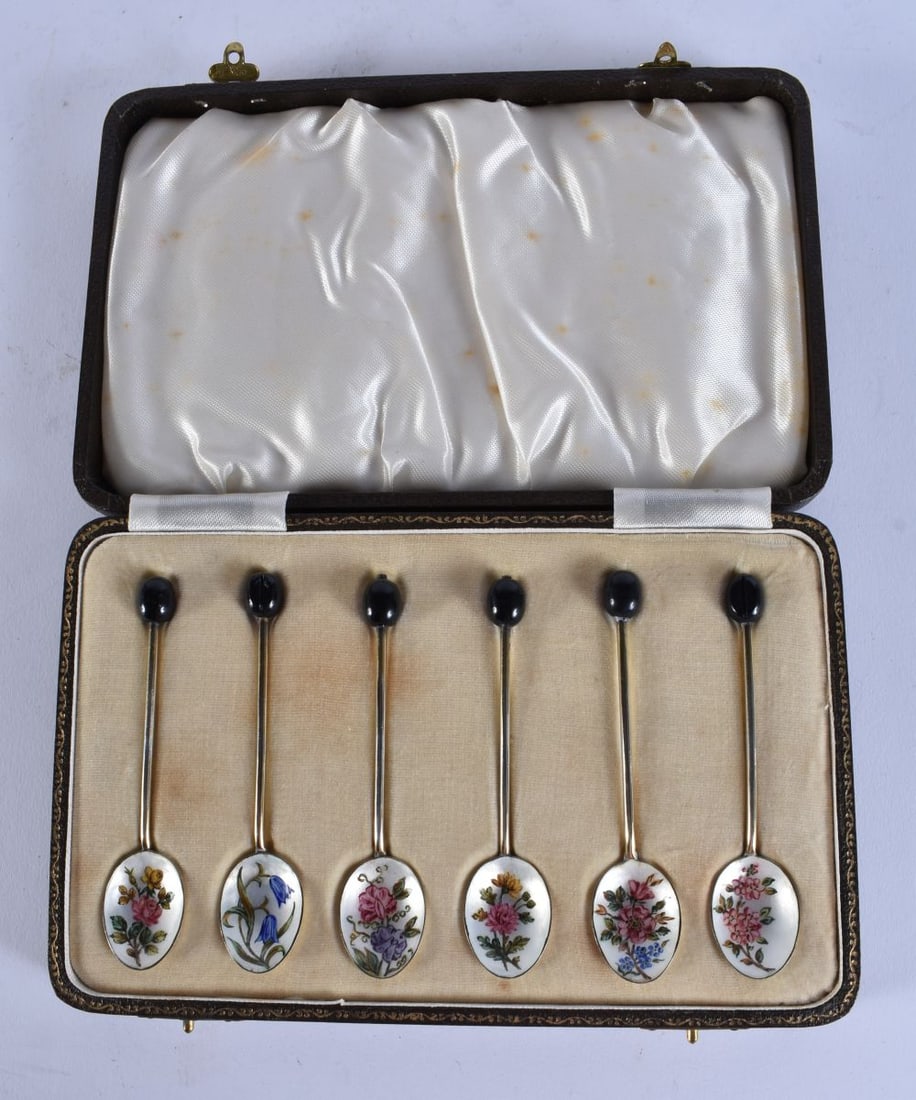 A SET OF SILVER AND FLORAL ENAMEL COFFEE SPOONS. 48 grams. 9.5 cm long. (6) (1 of 7)