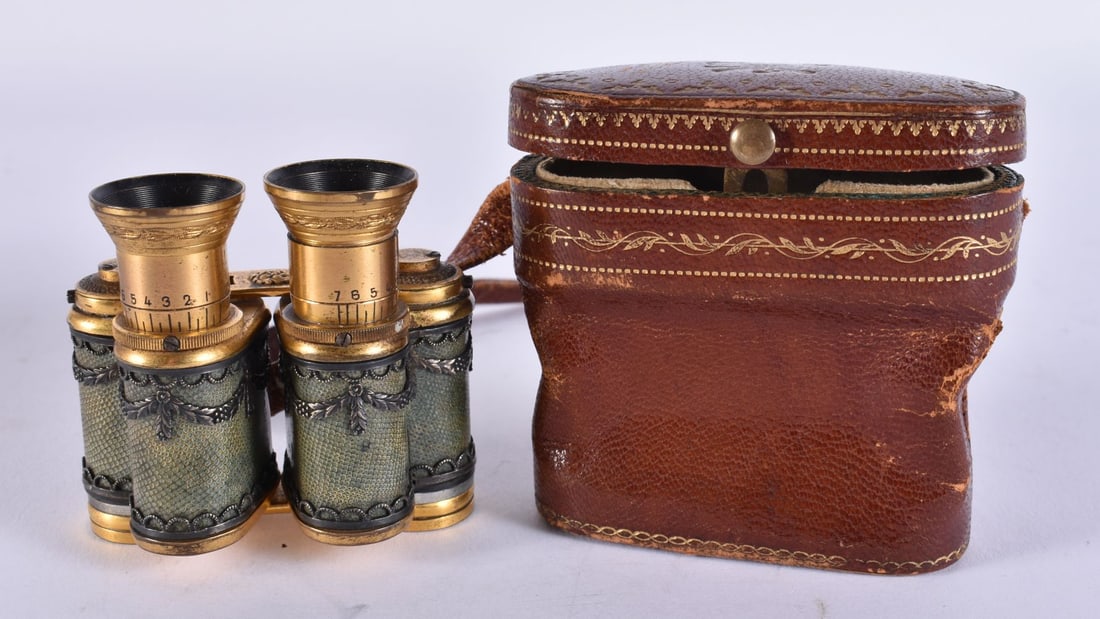 A FINE PAIR OF EARLY 19TH CENTURY SHAGREEN CASED OPERA GLASSES overlaid in silver 9.5 cm x 5.5 cm ex: A FINE PAIR OF EARLY 19TH CENTURY SHAGREEN CASED OPERA GLASSES overlaid in silver 9.5 cm x 5.5 cm extended.