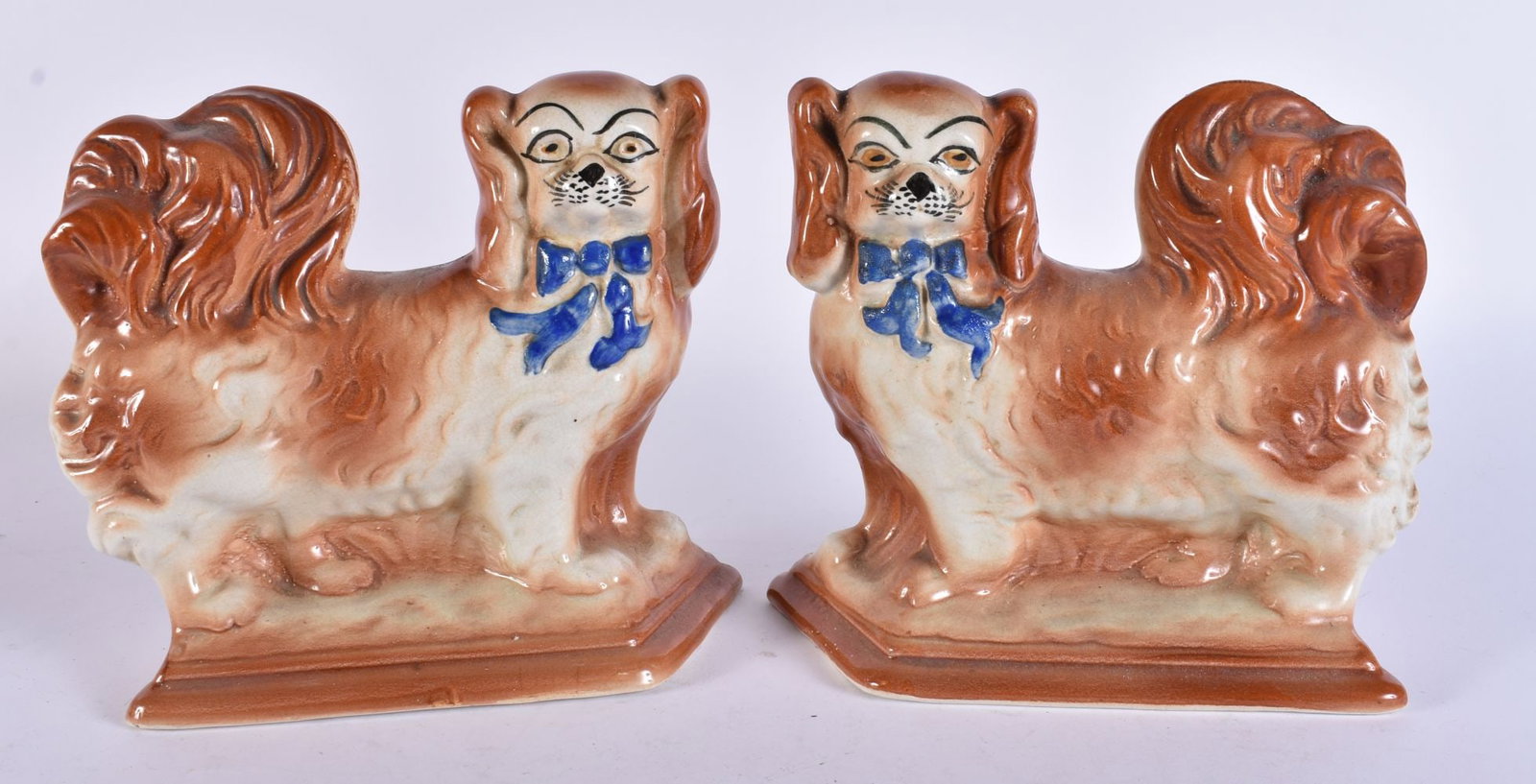 A PAIR OF UNUSUAL ANTIQUE STAFFORDSHIRE DOGS. 19 cm x 17 cm. (1 of 5)