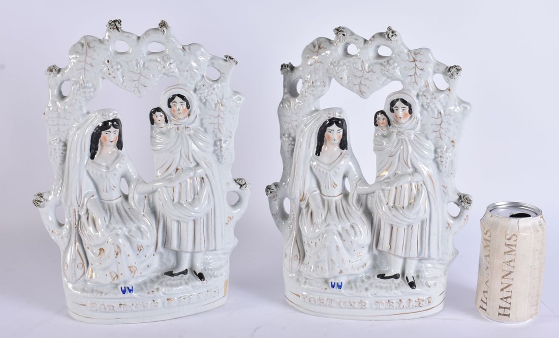 A PAIR OF VICTORIAN STAFFORDSHIRE FIGURAL GROUPS. 30 cm x 18 cm. (1 of 4)