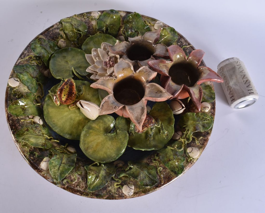 A LARGE AND UNUSUAL CONTINENTAL MAJOLICA PALISSY STYLE DISH decorated with toads and open flowers. 4 (1 of 6)