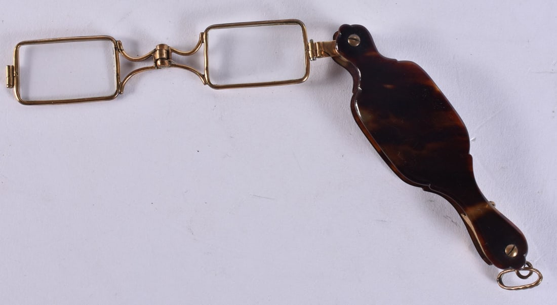 A PAIR OF TORTOISESHELL LORGNETTES. 12 cm x 8 cm. (1 of 3)