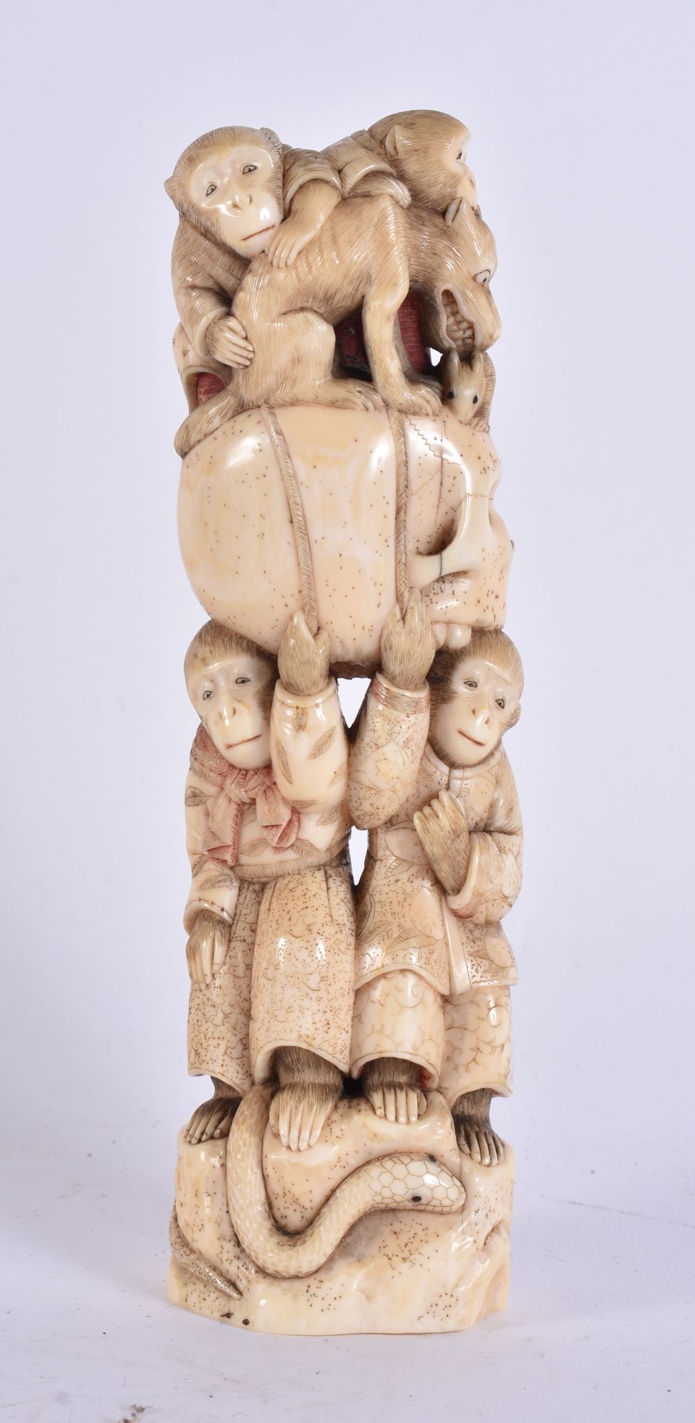 A 19TH CENTURY JAPANESE MEIJI PERIOD CARVED STAG ANTLER GROUP depicting monkeys. 15 cm high. (1 of 5)