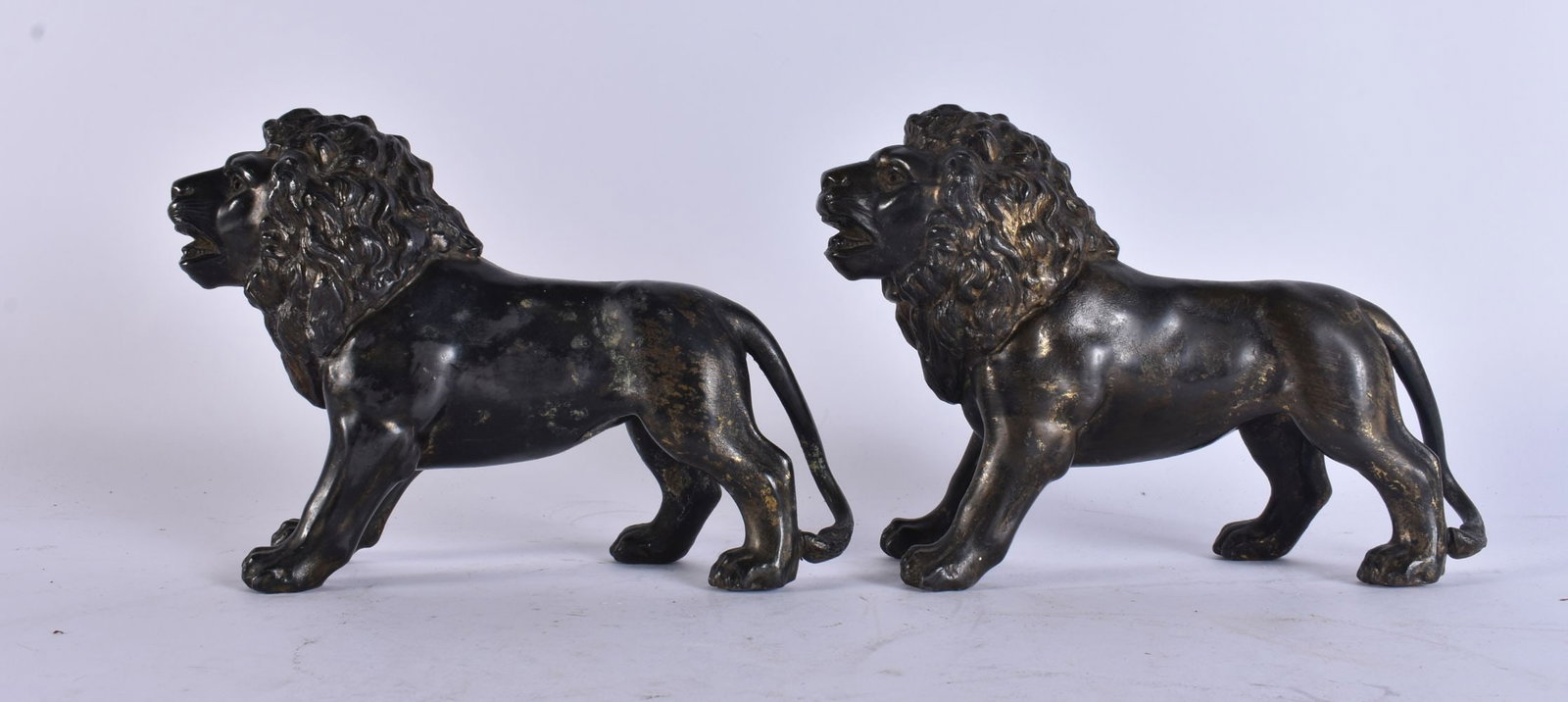 A PAIR OF ANTIQUE BRONZED SPELTER FIGURES OF LIONS. 22 cm x 15 cm. (1 of 5)