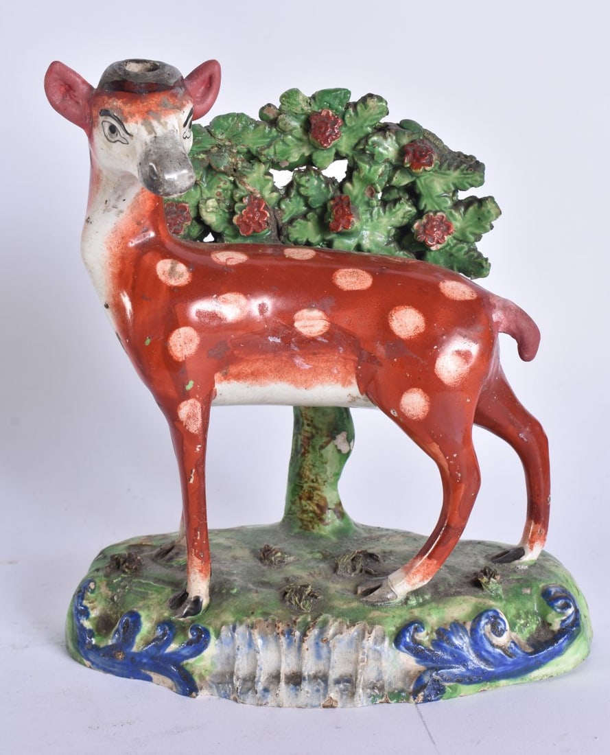 AN EARLY 19TH CENTURY STAFFORDSHIRE FIGURE OF A SPOTTED DEER. 18 cm x 12 cm. (1 of 5)