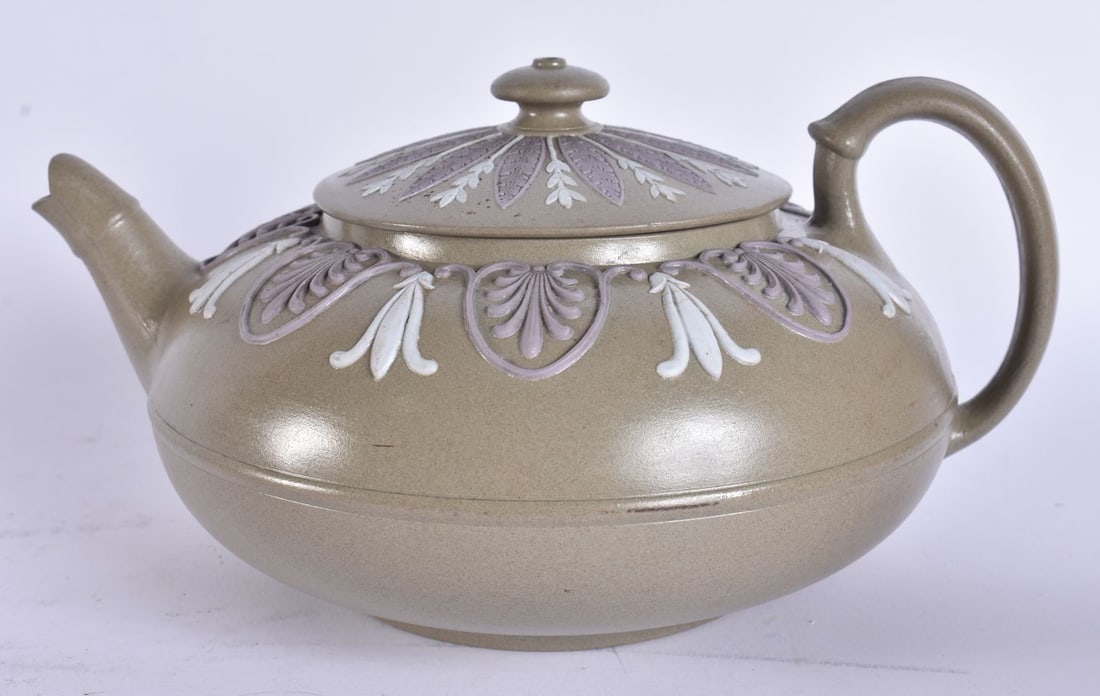 AN UNUSUAL ANTIQUE TRI COLOUR WEDGWOOD POTTERY TEAPOT AND COVER. 21 cm wide.: AN UNUSUAL ANTIQUE TRI COLOUR WEDGWOOD POTTERY TEAPOT AND COVER. 21 cm wide.