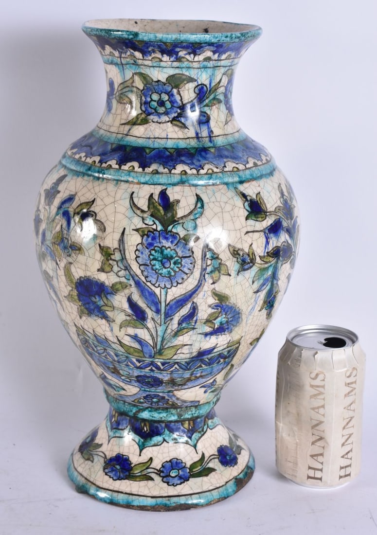 A LARGE 19TH CENTURY MIDDLE EASTERN ISLAMI FAIENCE IZNIK VASE. 34.5 cm high. (1 of 5)