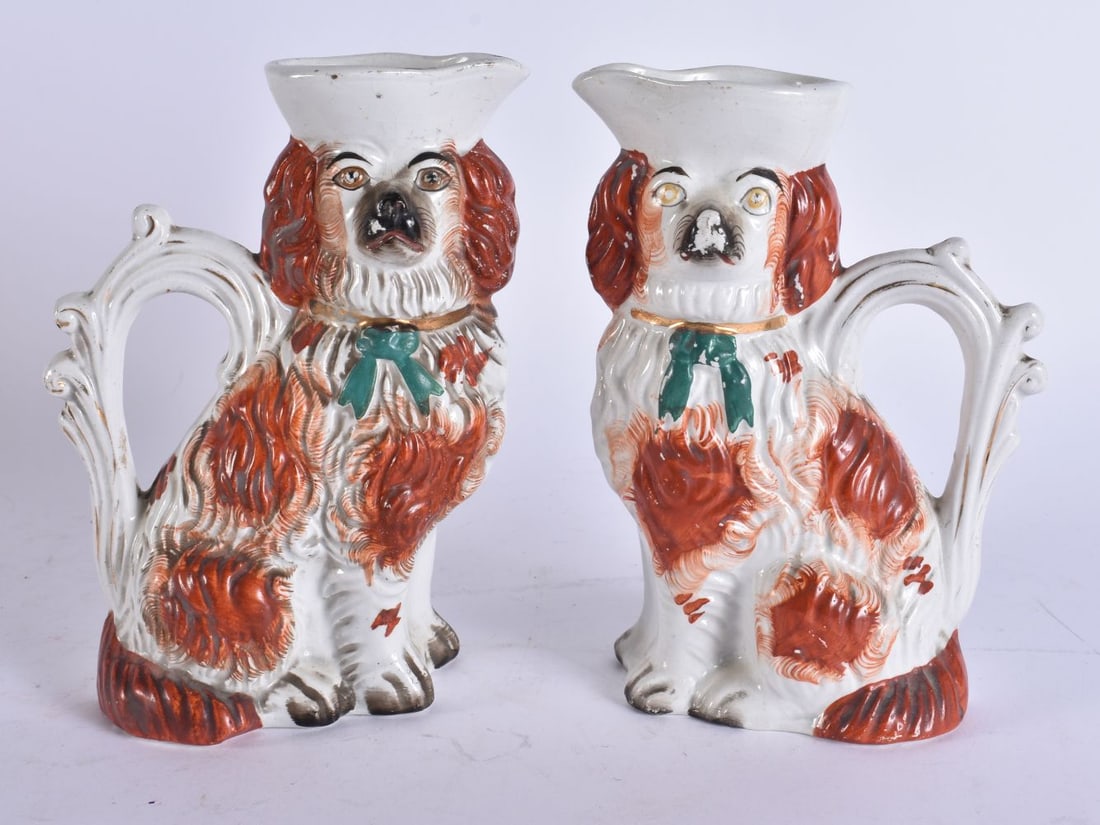 AN UNUSUAL PAIR OF VICTORIAN STAFFORDSHIRE POTTERY SPANIEL JUGS. 20 cm high. (1 of 6)