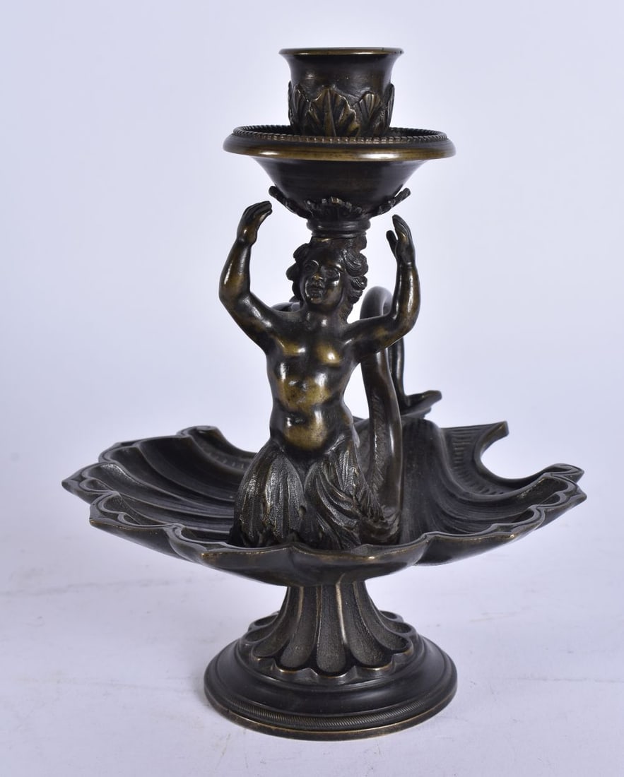 A FINE 19TH CENTURY EUROPEAN GRAND TOUR BRONZE CHAMBERSTICK formed as a semi clad putti upon a shell (1 of 6)