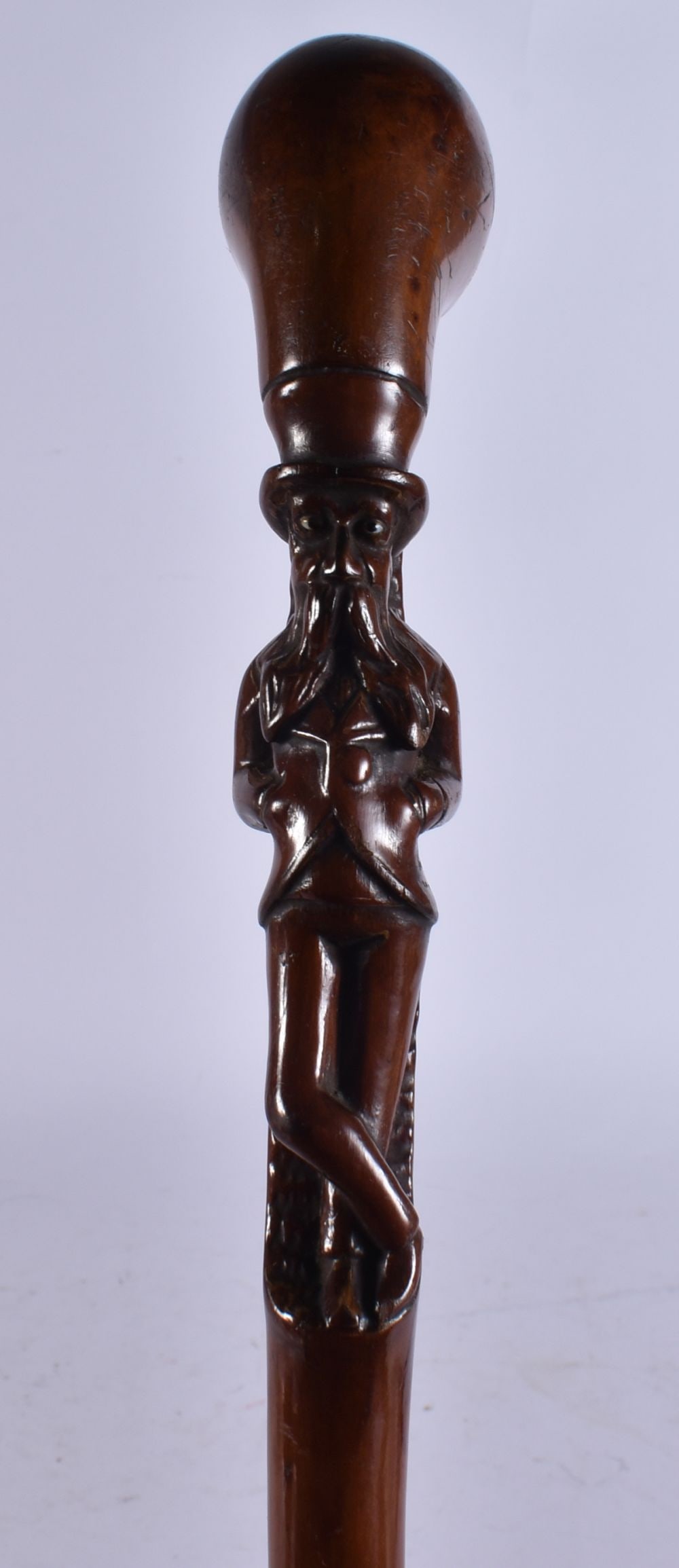 A LOVELY EARLY 19TH CENTURY ELONGATED BEARDED MALE WOOD WALKING CANE. 84 cm long.: A LOVELY EARLY 19TH CENTURY ELONGATED BEARDED MALE WOOD WALKING CANE. 84 cm long.
