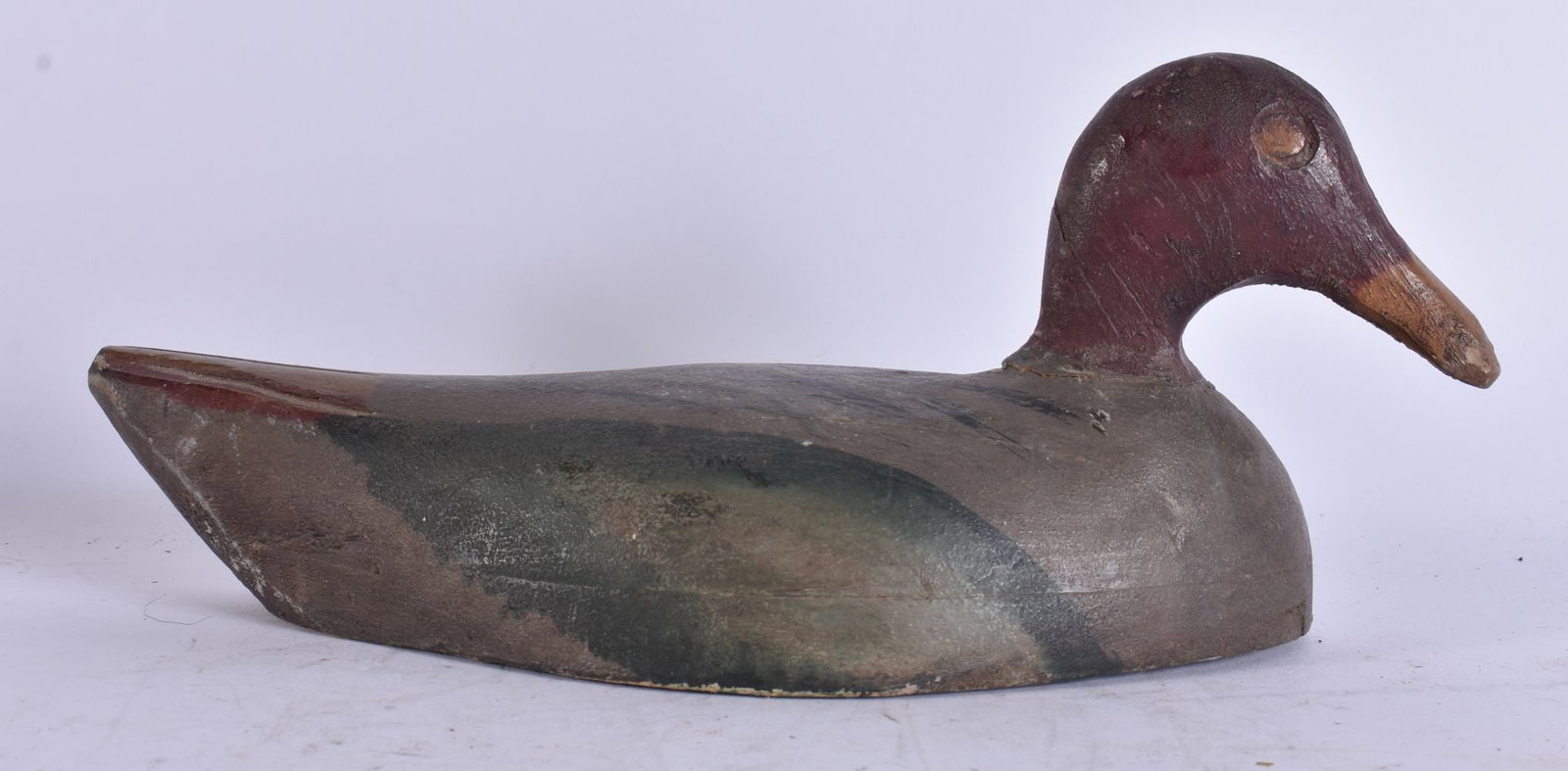 A FOLK ART CARVED WOOD DUCK DECOY. 27 cm wide. (1 of 3)