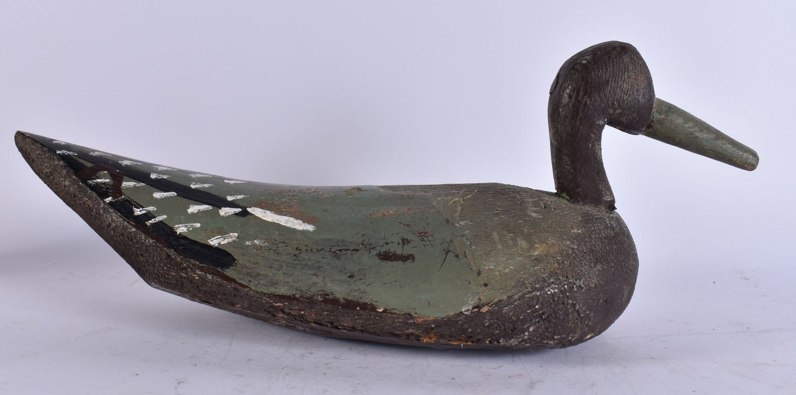 A FOLK ART CARVED WOOD DUCK DECOY. 31 cm wide. (1 of 3)