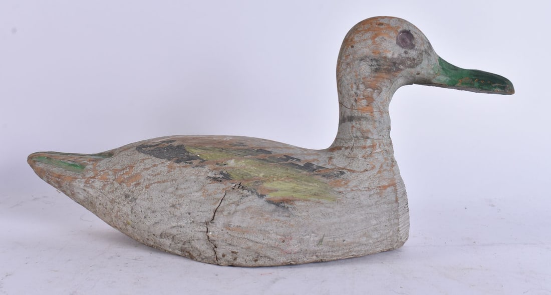 A FOLK ART CARVED WOOD DUCK DECOY. 27 cm wide. (1 of 3)