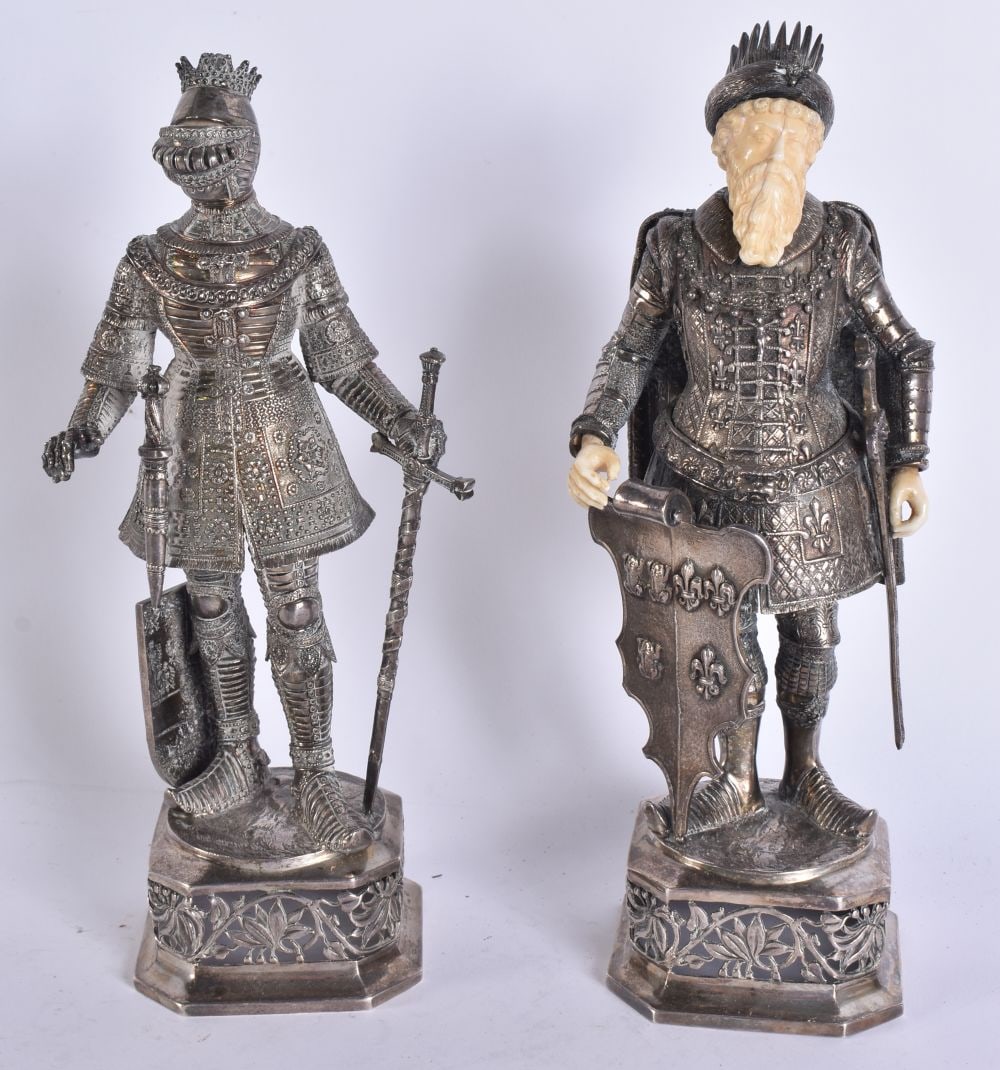 A FINE PAIR OF 19TH CENTURY GERMAN SILVER FIGURES by Berthold Muller, modelled standing upon reticul (1 of 8)