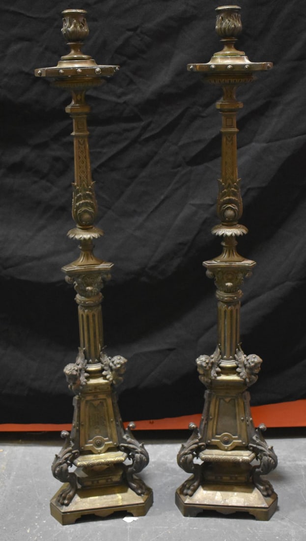 A LARGE PAIR OF 19TH CENTURY CONTINENTAL BRONZE FLOOR CANDLESTICKS modelled with mask heads. 100 cm (1 of 7)