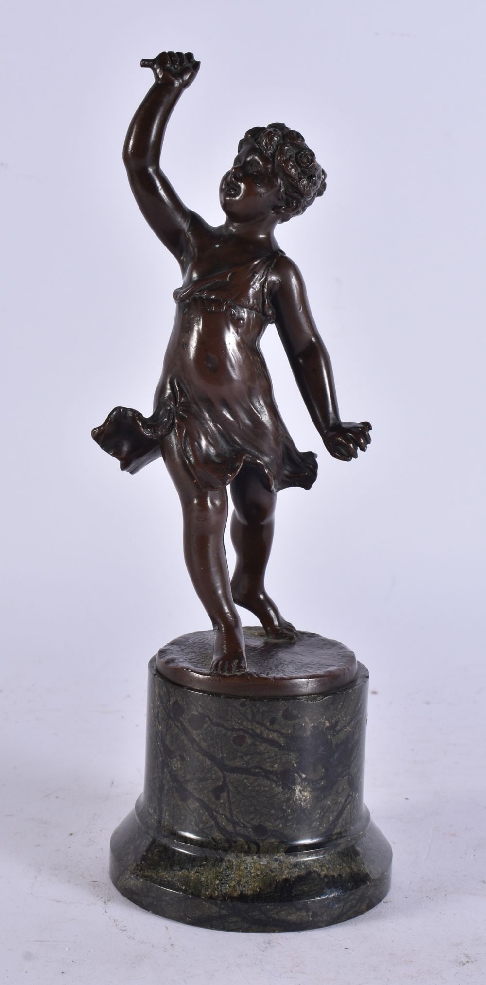 A LATE 19TH CENTURY FRENCH BRONZE FIGURE OF A GIRL modelled upon a marble base. 25 cm high.: A LATE 19TH CENTURY FRENCH BRONZE FIGURE OF A GIRL modelled upon a marble base. 25 cm high.