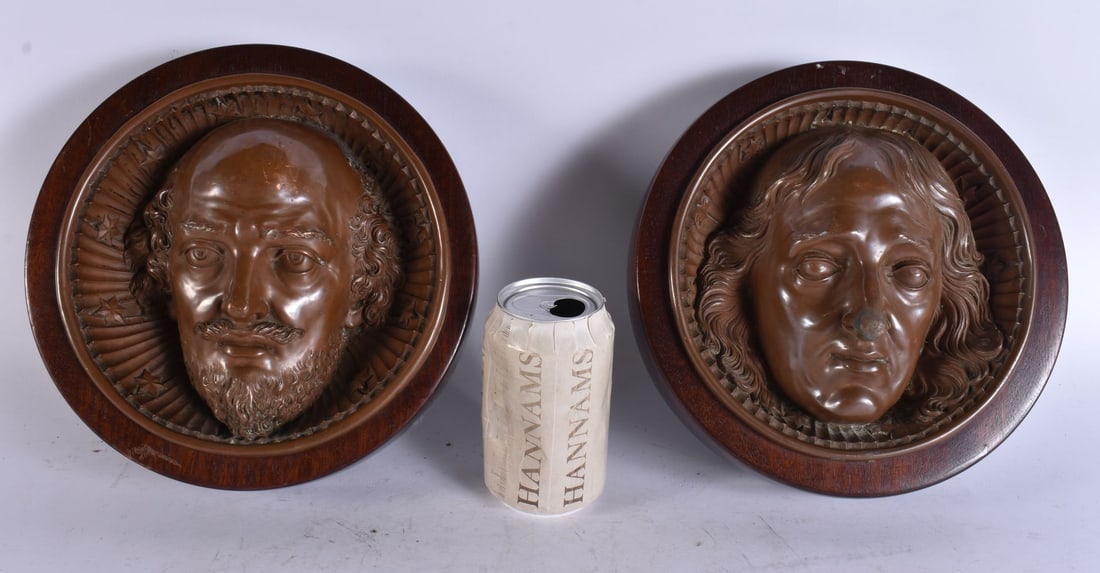 A PAIR OF EARLY VICTORIAN COPPER REPOUSSE WOOD CASED PORTRAIT PLAQUES. 22.5 cm wide. (1 of 4)