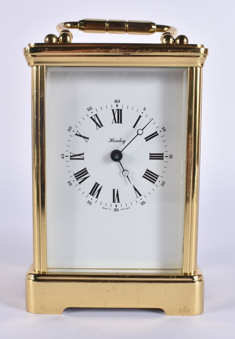 A BRASS CARRIAGE CLOCK. 18 cm high inc handle. (1 of 7)