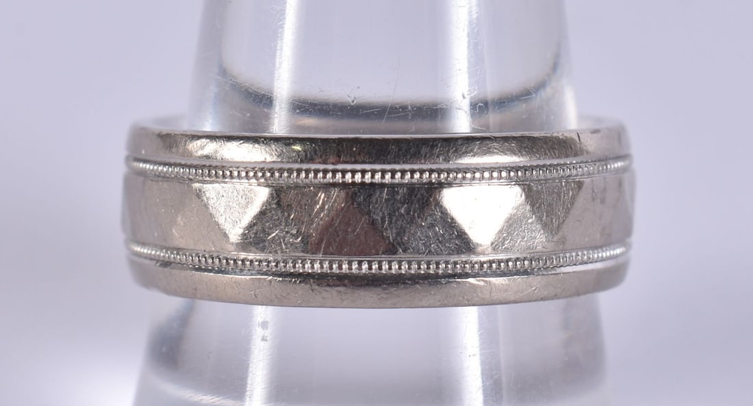 An 18ct white gold wedding band ring, maker CPM, Birmingham 2003, faceted and beaded decoration, ban (1 of 5)