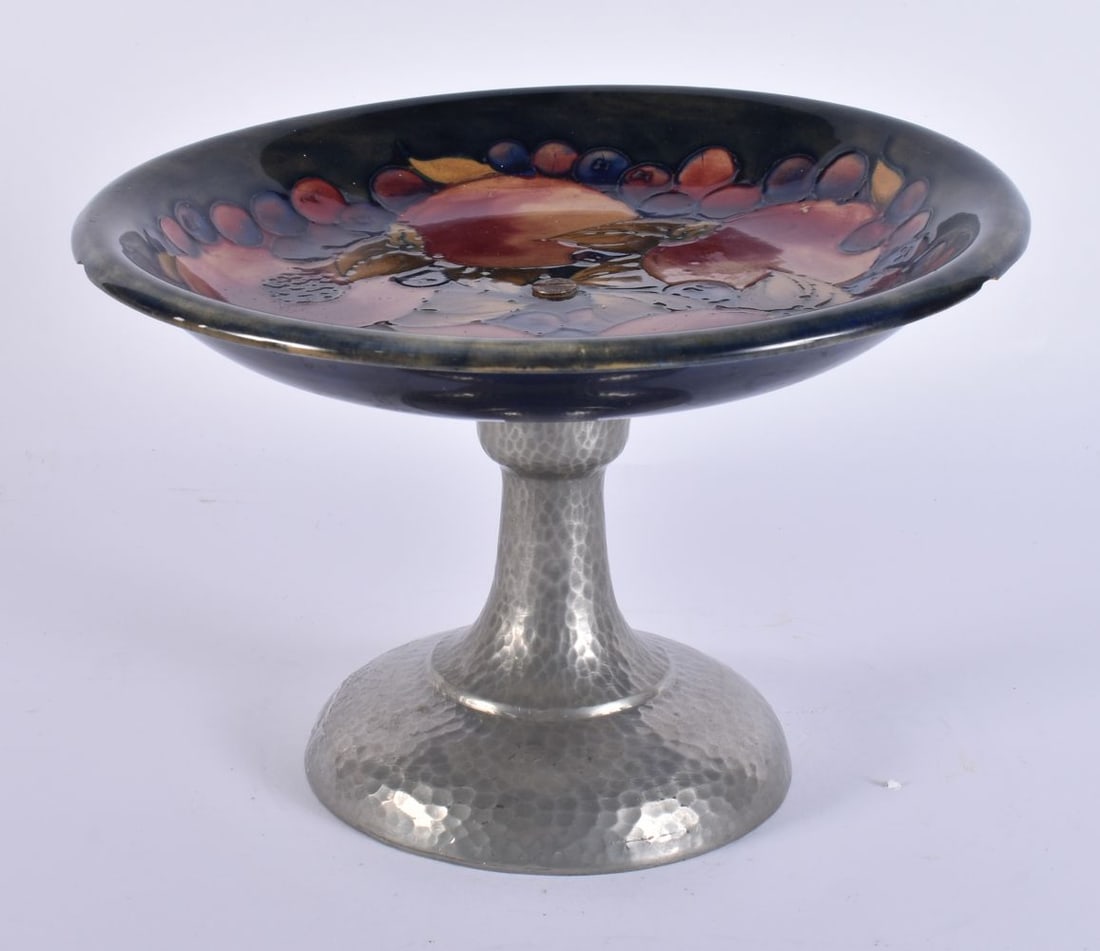A MOORCROFT PEWTER MOUNTED PEDESTAL DISH. 22 cm wide.: A MOORCROFT PEWTER MOUNTED PEDESTAL DISH. 22 cm wide.