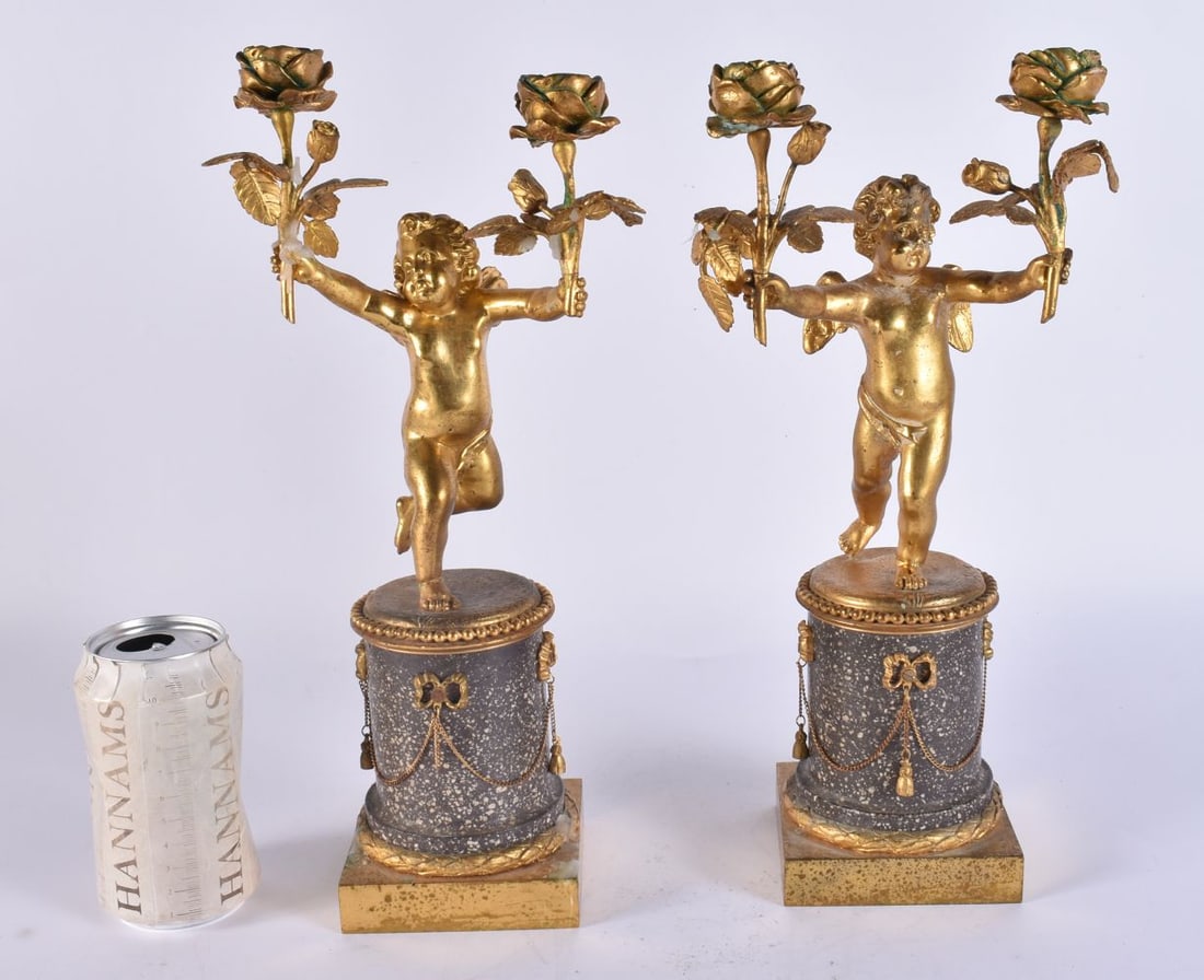A PAIR OF 19TH CENTURY FRENCH GILT BRONZE PUTTI CANDLESTICKS. 33 cm high. (1 of 7)