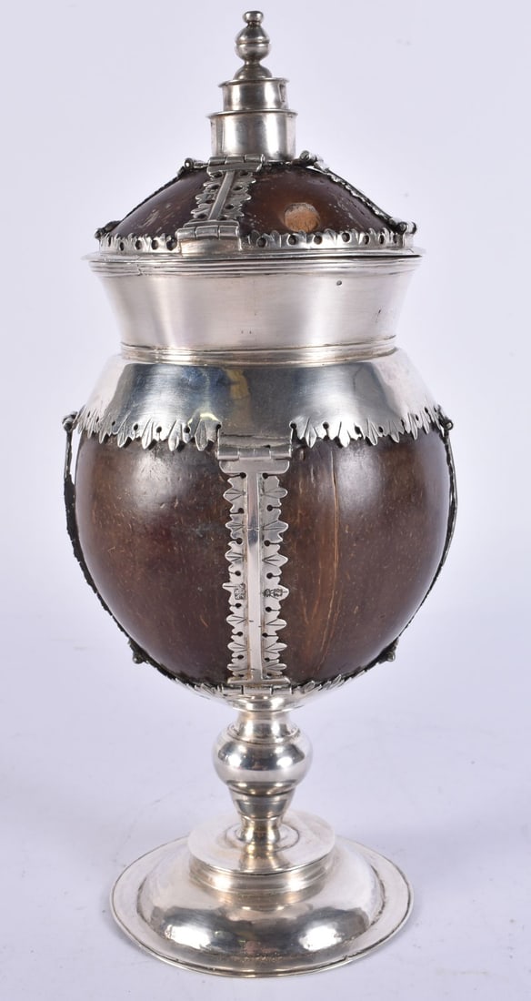A FINE SILVER MOUNTED COCONUT CADDY AND COVER by Alfred James Pairpoint. London 1915. 23.5 cm high. (1 of 7)