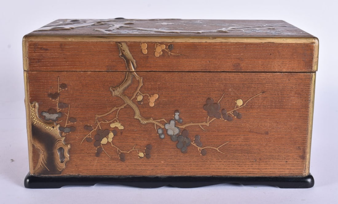 A 19TH CENTURY JAPANESE MEIJI PERIOD LACQUERED WOOD BOX AND COVER overlaid with trees and vines. 25 (1 of 6)